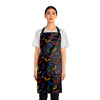 A person wearing a NerdyKeppie Engraved Bats Rainbow Gay Pride Apron With Pocket. A black apron with an Engraved Bats design on it in rainbow gay pride colors. This rainbow gay pride pocket apron is made of durable 100% polyester.
