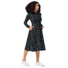 A person wearing a NerdyKeppie Engraved Bats Trans Pride Long Sleeve Midi Dress With Pockets. 