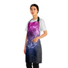 A person wearing a NerdyKeppie Galaxy Bi Pride Apron With Pocket. A black apron with a galaxy design on it in bisexual pride colors. This bi pride pocket apron is made of durable 100% polyester.