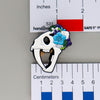 NerdyKeppie Proud to the Bone Sabertooth Tiger Skull Pride Enamel Pins. A Sabertooth Tiger skull pride enamel pin for our Proud to the Bone project, a perfect prehistoric gift for your favorite nerd. This prehistoric pin wears an adorable flower crown!