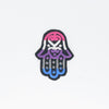 NerdyKeppie's Genderfluid Hamsa Embroidered Pride Patch are stitched on black duck cloth and backed by sturdy vinyl fuse.
