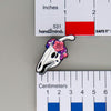 NerdyKeppie Proud to the Bone Parasauralophus Skull Pride Enamel Pins. A Parasauralophus skull pride enamel pin for our Proud to the Bone project. This prehistoric pin is wearing an adorable crown of flowers!