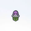 NerdyKeppie's Genderqueer Hamsa Embroidered Pride Patch are stitched on black duck cloth and backed by sturdy vinyl fuse.