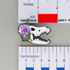 NerdyKeppie Proud to the Bone Dire Wolf Skull Pride Enamel Pins. A Dire Wolf skull pride enamel pin for our Proud to the Bone project. This prehistoric pin is wearing an adorable crown of flowers!