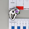NerdyKeppie Proud to the Bone Sabertooth Tiger Skull Pride Enamel Pins. A Sabertooth Tiger skull pride enamel pin for our Proud to the Bone project, a perfect prehistoric gift for your favorite nerd. This prehistoric pin wears an adorable flower crown!