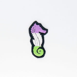 NerdyKeppie's Genderqueer Seahorse Embroidered Pride Patch are shaped like their namesake and stitched on black duck cloth!