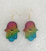 NerdyKeppie Hamsa Pride Acrylic Earrings. Our acrylic gay pride Hamsa earrings have hypoallergenic steel hooks. These comfortable earrings are a great gay pride gift and ship from Portland, Oregon.