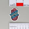 NerdyKeppie Hamsa Pride Sticker. A NerdyKeppie matte sticker featuring a Hamsa or Hand of Miriam in your choice of pride colors. This gay pride sticker ships from Portland, Oregon.
