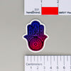 NerdyKeppie Hamsa Pride Sticker. A NerdyKeppie matte sticker featuring a Hamsa or Hand of Miriam in your choice of pride colors. This gay pride sticker ships from Portland, Oregon.
