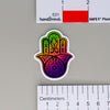 NerdyKeppie Hamsa Pride Sticker. A NerdyKeppie matte sticker featuring a Hamsa or Hand of Miriam in your choice of pride colors. This gay pride sticker ships from Portland, Oregon.