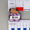 NerdyKeppie Capybara Enamel Queer Pride Pronoun Pins. Our enamel pin features an adorable capybara, a paper scroll with seven different pronoun choices, and flowers in queer pride colors. This pride pin ships from Portland, Oregon.