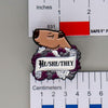 NerdyKeppie Capybara Enamel Ace Pride Pronoun Pins. Our enamel pin features an adorable capybara, a paper scroll with five different pronoun choices, and flowers in asexual pride colors. This pride pin ships from Portland, Oregon.