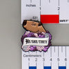 NerdyKeppie Capybara Enamel Queer Pride Pronoun Pins. Our enamel pin features an adorable capybara, a paper scroll with seven different pronoun choices, and flowers in queer pride colors. This pride pin ships from Portland, Oregon.