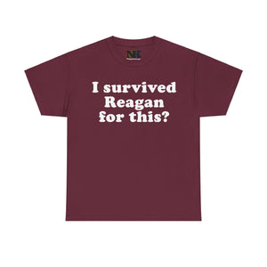 NerdyKeppie "I Survived Reagan For This?" Cotton Queer Pride Tee Shirt. A unisex cotton tee shirt with an "I Survived Reagan For This?" design on it. This queer pride tee shirt has a classic fit.