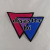 NerdyKeppie's Large (8" x 9") Black Letters "Disaster Bi" Embroidered Bisexual Pride Patch are stitched on black duck cloth and backed by sturdy vinyl fuse.