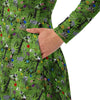 A person wearing a NerdyKeppie Lemurs Progress Pride Long Sleeve Midi Dress With Pockets. 