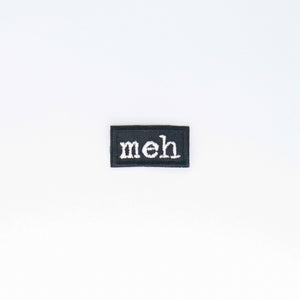 NerdyKeppie's "Meh" Embroidered Patch are stitched on sturdy rectangular duck cloth and backed with vinyl fuse.