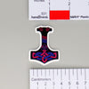 NerdyKeppie Mjolnir Pride Sticker. A NerdyKeppie matte sticker of a Mjolnir/Thor's Hammer with knotwork in eight different pride flags. This pride sticker ships from Portland, Oregon.