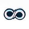 NerdyKeppie's Neurodiverse Infinity Symbol Embroidered Pride Patch are stitched on black duck cloth and backed by sturdy vinyl fuse.