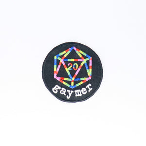 NerdyKeppie's No Hooked Backing "Gaymer" with D20 Embroidered Rainbow Gay Pride Patch are stitched on black duck cloth and backed by sturdy vinyl fuse.