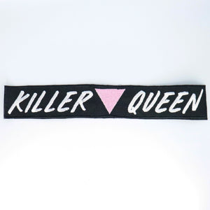 NerdyKeppie's No Hooked Backing "Killer Queen" Pink Triangle Embroidered Patch are stitched on sturdy rectangular duck cloth and backed with vinyl fuse.