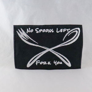 NerdyKeppie's No Hooked Backing "No Spoons Left Fork You" Embroidered Disability Pride Patch are stitched on black duck cloth and backed by sturdy vinyl fuse.