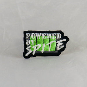 NerdyKeppie's No Hooked Backing "Powered By Spite" Embroidered Patch are stitched on black duck cloth and backed by sturdy vinyl fuse.