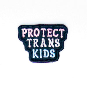 NerdyKeppie's No Hooked Backing "Protect Trans Kids" Embroidered Trans Pride Patch are stitched on black duck cloth and backed by sturdy vinyl fuse.