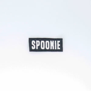 NerdyKeppie's No Hooked Backing "Spoonie" Embroidered Disability Pride Patch are stitched on sturdy rectangular duck cloth and backed with vinyl fuse.