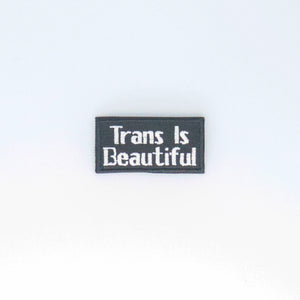 NerdyKeppie's No Hooked Backing "Trans is Beautiful" Embroidered Trans Pride Patch are stitched on sturdy rectangular duck cloth and backed with vinyl fuse.