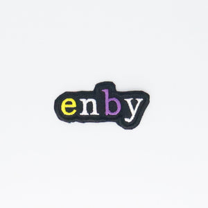 NerdyKeppie's No Hooked Backing "enby" Embroidered Non-Binary Pride Patch are stitched on black duck cloth and backed by sturdy vinyl fuse.