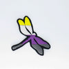 NerdyKeppie's Non-Binary BONEYARD Dragonfly Embroidered Pride Patch are shaped like their namesake and stitched on black duck cloth!