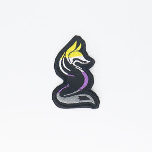 NerdyKeppie's Non-Binary Fox Embroidered Pride Patch are shaped like their namesake and stitched on black duck cloth!