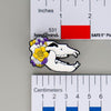 NerdyKeppie Proud to the Bone Cave Bear Skull Pride Enamel Pins. A cave bear skull pride enamel pin for our Proud to the Bone project. This prehistoric pin wears an adorable flower crown & makes a perfect nerd gift!