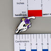 NerdyKeppie Proud to the Bone Parasauralophus Skull Pride Enamel Pins. A Parasauralophus skull pride enamel pin for our Proud to the Bone project. This prehistoric pin is wearing an adorable crown of flowers!