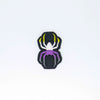 NerdyKeppie's Non-Binary Spider Embroidered Pride Patch are shaped like their namesake and stitched on black duck cloth!