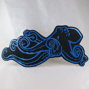 NerdyKeppie's Octopus Embroidered Back Patch are shaped like their namesake and stitched on black duck cloth!