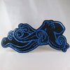 NerdyKeppie's Octopus Embroidered Back Patch are shaped like their namesake and stitched on black duck cloth!