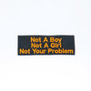 NerdyKeppie's Orange "Not A Boy Not A Girl Not Your Problem" Embroidered Patch are stitched on sturdy rectangular duck cloth and backed with vinyl fuse.