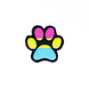NerdyKeppie's Pan Dog Paw Embroidered Pride Patch are shaped like their namesake and stitched on black duck cloth!