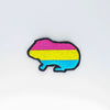 NerdyKeppie's Pan Guinea Pig Embroidered Pride Patch are shaped like their namesake and stitched on black duck cloth!