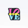 NerdyKeppie's Pan Philly LOVE Statue Embroidered Pride Patch are shaped like their namesake and stitched on black duck cloth!