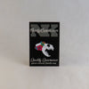NerdyKeppie Proud to the Bone Otter Skull Pride Enamel Pins. An otter skull pride enamel pin for our Proud to the Bone project, wearing an adorable crown of flowers!