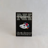 NerdyKeppie Proud to the Bone Possum Skull Pride Enamel Pins. A possum skull pride enamel pin for our Proud to the Bone project, wearing an adorable crown of flowers!
