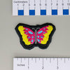 NerdyKeppie's Pan Psychedelic Butterfly Embroidered Pride Patch are shaped like their namesake and stitched on black duck cloth!