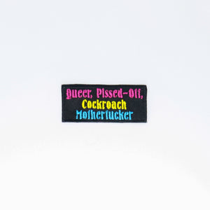 NerdyKeppie's Pan "Queer Pissed Off Cockroach Motherfucker" Embroidered Pride Patch are stitched on sturdy rectangular duck cloth and backed with vinyl fuse.