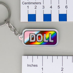 NerdyKeppie-"DOLL" Mirrored Pride Keychain-Progress