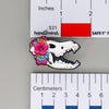 NerdyKeppie Proud to the Bone Dire Wolf Skull Pride Enamel Pins. A Dire Wolf skull pride enamel pin for our Proud to the Bone project. This prehistoric pin is wearing an adorable crown of flowers!