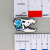 NerdyKeppie Proud to the Bone Dire Wolf Skull Pride Enamel Pins. A Dire Wolf skull pride enamel pin for our Proud to the Bone project. This prehistoric pin is wearing an adorable crown of flowers!