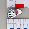NerdyKeppie Proud to the Bone Triceratops Skull Pride Enamel Pins. A Triceratops skull pride enamel pin for our Proud to the Bone project. This prehistoric pin is wearing an adorable crown of flowers!